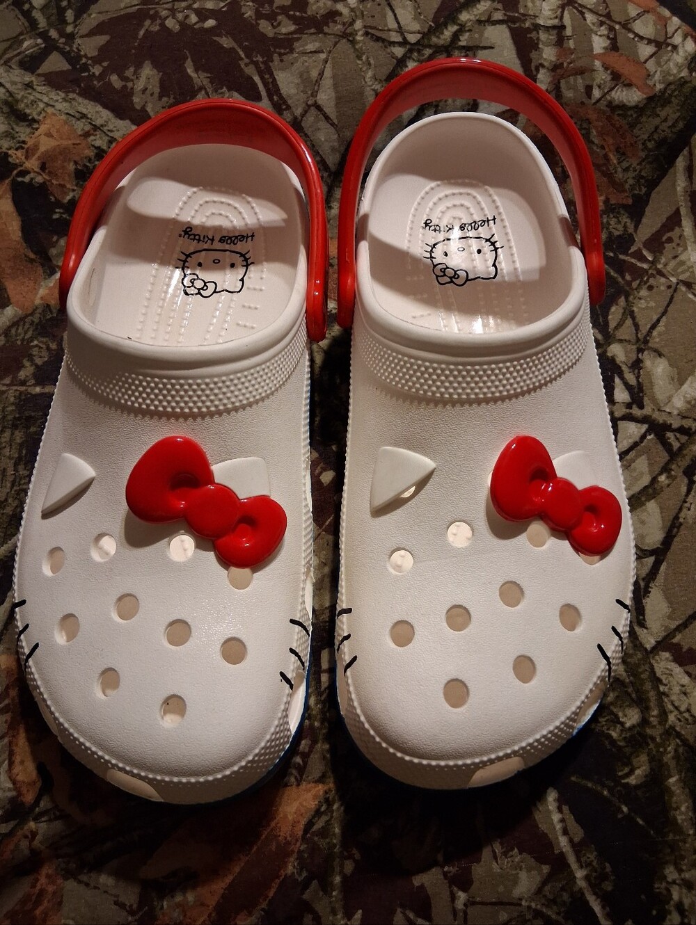 Hello Kitty Crocs mens sz. 12, womans sz 14.
